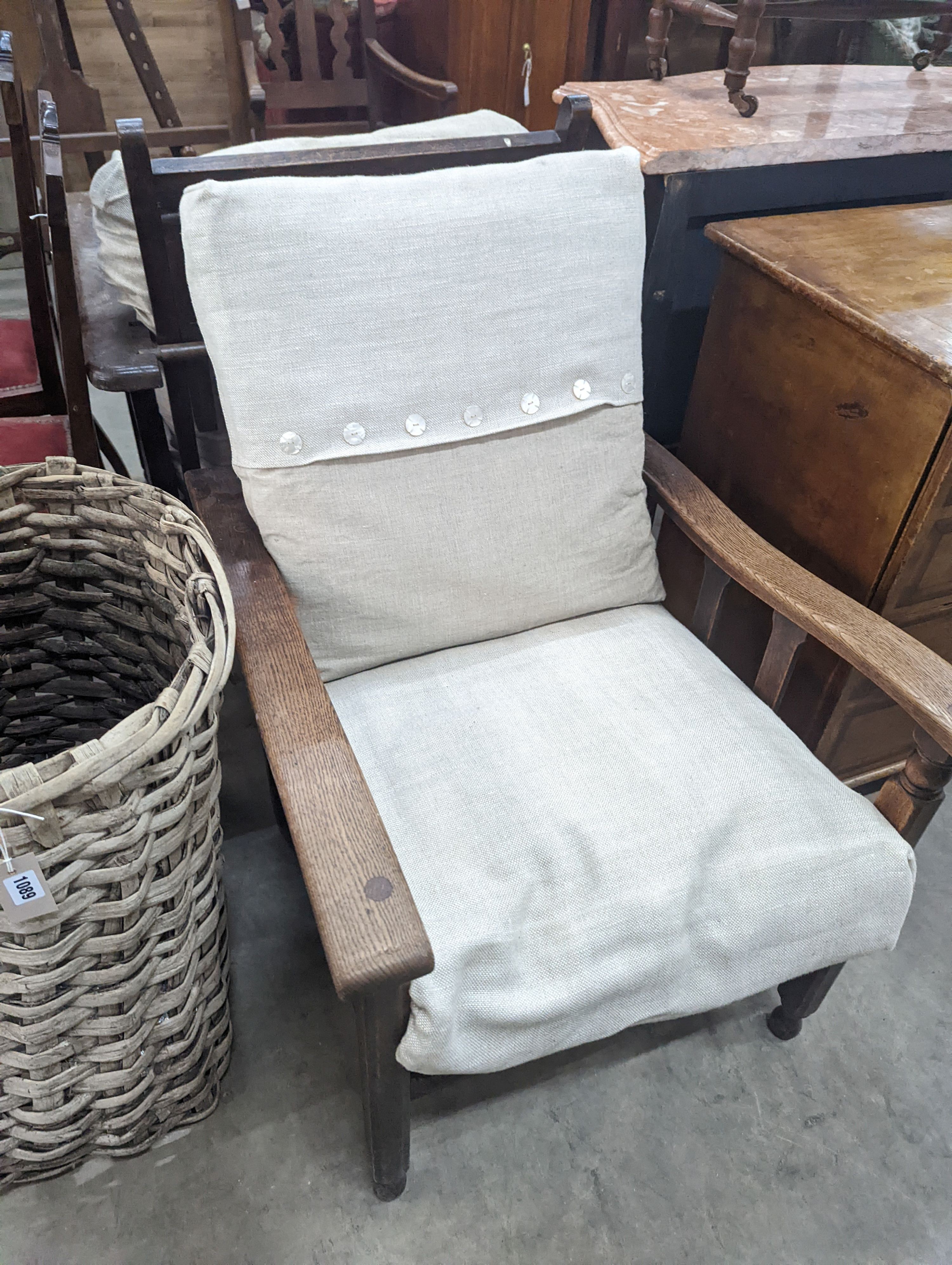 Two early 20th century oak reclining armchairs, larger width 73cm, depth 86cm, height 93cm